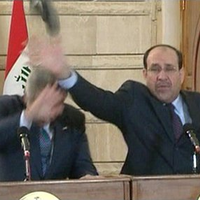 Iraqi Shoe Toss