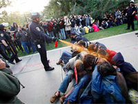 Casually Pepper Spraying Cop Identified