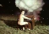 Nude Piano Player