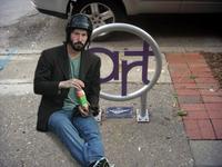 Sad Keanu in a Helmet