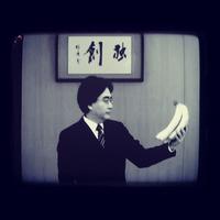 Satoru Iwata Holding Bananas
