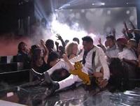 Miguel's Fan-Kicking Stage Dive